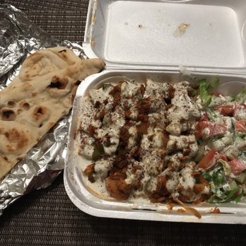 Flame Kabob House - "Chicken Shawarma w/ 1 order of Naan" The chicken is very tender & flavorful. The white sauce on top is heavenly! - Afghan Near Me - Lawrenceville, Georgia