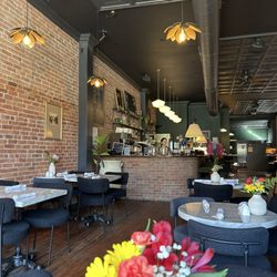 Cafe Nouveau - The counter and fresh flowers on the table.