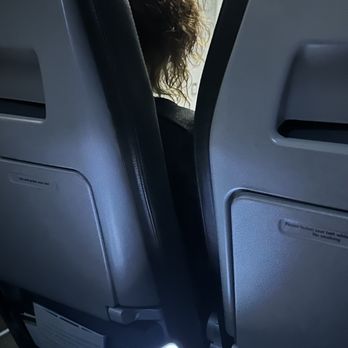 Frontier Airlines - This is the stewardess sitting in my seat that I paid for nice and comfortable for her - Airlines Near Me - Santa Ana, California Frontier Airlines - This is the stewardess sitting in my seat that I paid for nice and comfortable for her - Airlines Near Me - Santa Ana, California