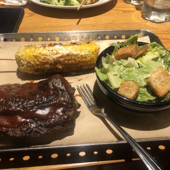 Chili's - 1/2 rack ribs - substituted usual sides with Caesar salad & mexican street corn - Bars Near Me - Naples, Florida Chili's - 1/2 rack ribs - substituted usual sides with Caesar salad & mexican street corn - Bars Near Me - Naples, Florida