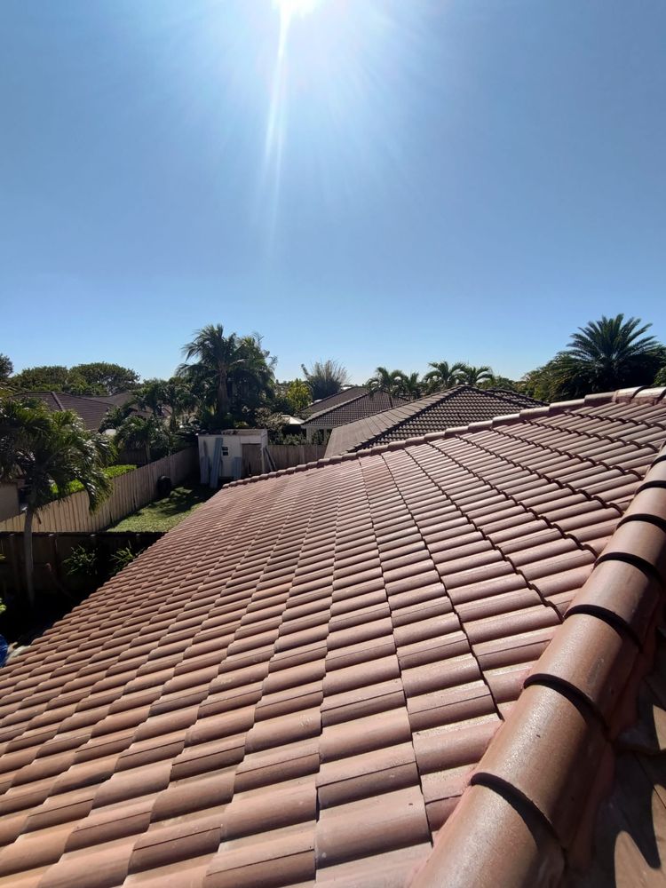 Slide of JMR Roofing Services
