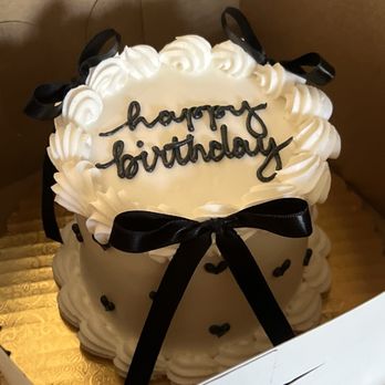 Butter + Cream Bakery - Simple black bow with heart smash cake for 13th bday.  Exactly like the picture I sent! - Bakeries Near Me - Los Alamitos, California