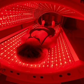 Evolution Rejuvenation - woman getting red light therapy - Weight Loss Centers Near Me - Boca Raton, Florida