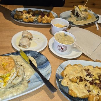 Maple Street Biscuit Company - Murfreesboro - Breakfast sandwich with gravy and loaded Tater Tots. - Breakfast & Brunch Near Me - Murfreesboro, Tennessee