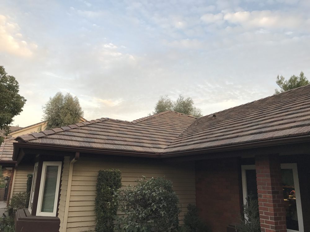 Slide of Valencia Roofing Company