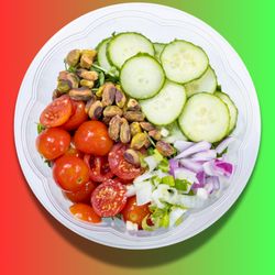 Clayton Farms Salads - Garden Salad: oakleaf/romaine, pea micros, red onion, green onion, tomatoes, cucumbers, pistachios, lemony herb dressing