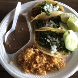 3 tacos with rice and beans, 2 steak and 1 al pastor
