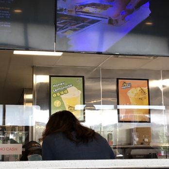 Kenko - a woman sitting at a counter in a fast food restaurant - Bubble Tea Near Me - Cleveland, Ohio