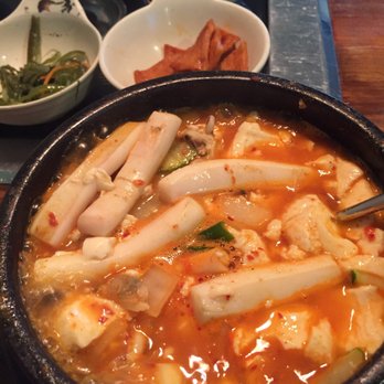 Masijta Grill - soon du bu - tofu soup with seafood. long white pieces are squid. - Korean Near Me - Urbana, Illinois Masijta Grill - soon du bu - tofu soup with seafood. long white pieces are squid. - Korean Near Me - Urbana, Illinois