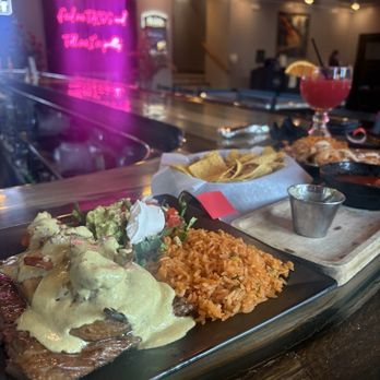 Glorias - Steak topped chili relleno. - New Mexican Cuisine Near Me - Sturgeon Bay, Wisconsin Glorias - Steak topped chili relleno. - New Mexican Cuisine Near Me - Sturgeon Bay, Wisconsin
