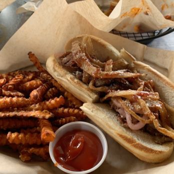 The Brass Tap - Steak sandwich and sweet potato fries. - American Near Me - Boynton Beach, Florida
