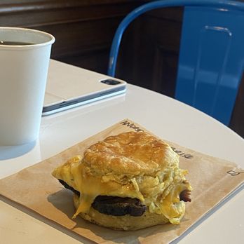 The Roaming Biscuit - Brisket egg and cheese biscuit and black coffee - Sandwiches Near Me - Cleveland, Ohio The Roaming Biscuit - Brisket egg and cheese biscuit and black coffee - Sandwiches Near Me - Cleveland, Ohio