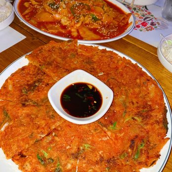 Rainpia - Kimchi pancake (front), and Rabokki (back) - Korean Near Me - Ellicott City, Maryland