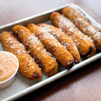 Beerhead Bar & Eatery - Crispy pickle fries coated in a seasoned batter, served with a tangy dipping sauce. - Bars Near Me - Novi, Michigan Beerhead Bar & Eatery - Crispy pickle fries coated in a seasoned batter, served with a tangy dipping sauce. - Bars Near Me - Novi, Michigan