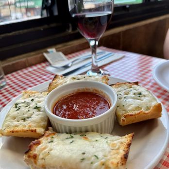 Win-Spuntino - Cheesy bread with homemade marinara sauce. Simple but delicious = simply delicious! - Italian Near Me - Honolulu, Hawaii