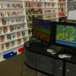 Play It Games Movies & Music - Classic games and a station to play them.