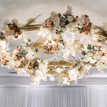 Venue By Three Petals - Chandelier with add-on florals - Venues & Event Spaces Near Me - Huntington Beach, California