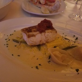 Ocean Prime - Alaskan halibet with sweet corn puree, slightly charred asparagus and lobster tortellini - Seafood Near Me - Denver, Colorado Ocean Prime - Alaskan halibet with sweet corn puree, slightly charred asparagus and lobster tortellini - Seafood Near Me - Denver, Colorado