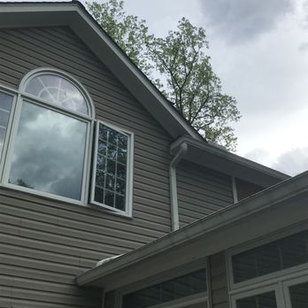 NOVA Rooftek - Water spots are near the down spout. - Roofing Near Me - McLean, Virginia