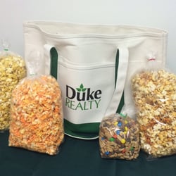 Royal Popcorn Factory - Sport your logo & snack on the go with a custom canvas tote snack sack! Great gift any time of year.