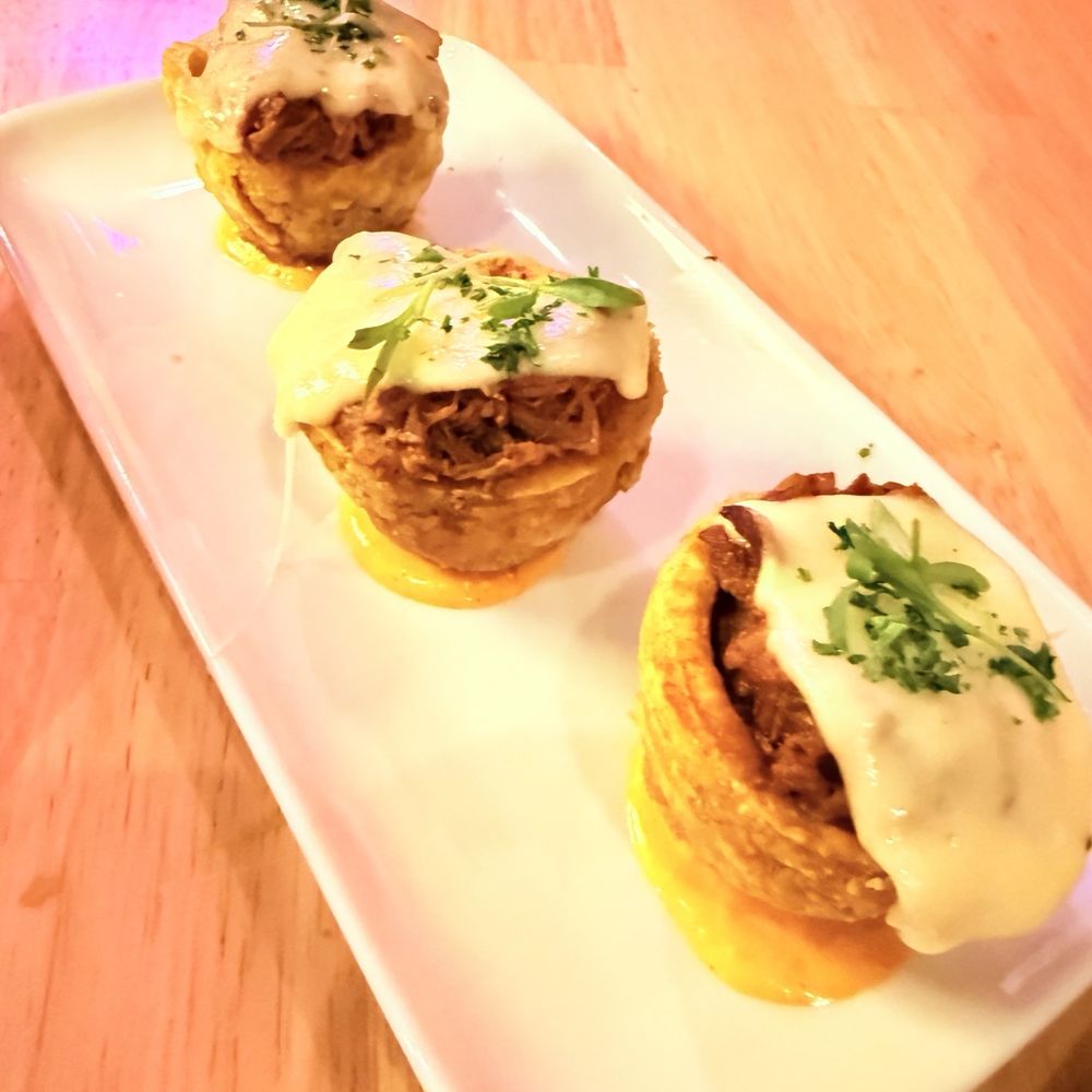 Tumbao Calle 8 - Santos Suarez Secrets - Tostones filled with tops Vieja and shredded cheese - Cuban Near Me - Miami, Florida Tumbao Calle 8 - Santos Suarez Secrets - Tostones filled with tops Vieja and shredded cheese - Cuban Near Me - Miami, Florida