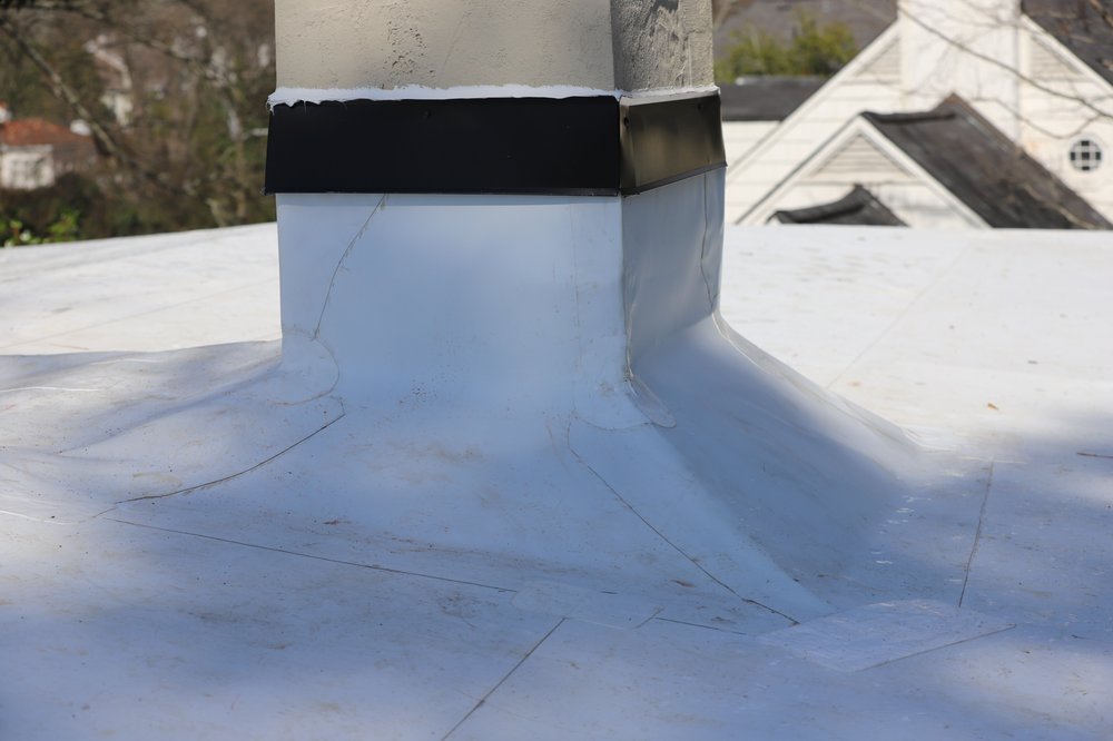 Slide of Bell Roofing