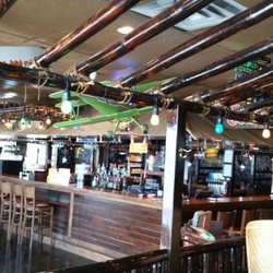 Jungle Jim's - Simple Canadian cusine.Delicious wings and cod.Portions are good sized.Best local beer is Jockey Club.$35 per person including beer.