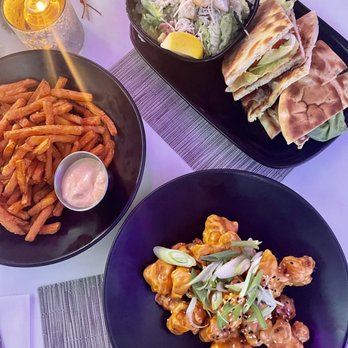 The Wild Fig Restaurant - Korean fried cauliflower (vegan), yam fries, tandoori chicken burger with Caesar salad - Wine Bars Near Me - Coquitlam, British Columbia The Wild Fig Restaurant - Korean fried cauliflower (vegan), yam fries, tandoori chicken burger with Caesar salad - Wine Bars Near Me - Coquitlam, British Columbia