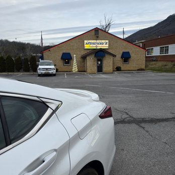 Don Ho's Restaurant & Lounge - My pearl white Lexus parked in the restaurant's parking lot with the restaurant's building in the background. - Lounges Near Me - Hollins, Virginia