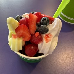 Yogurt Mountain - Pineapple sorbet, strawberry shortcake, blackberry and super chocolate topped with cherries, strawberries, and blackberries.