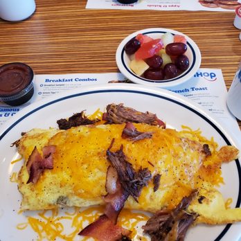 IHOP - Shredded beef,ham,sausage, cheese , peppers   onions  in an omelet with fruit cup  Very good bring an appetite. - American Near Me - Lake Ariel, Pennsylvania