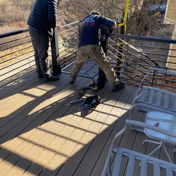Decks Unlimited - Attaching spiral staircase - Decks & Railing Near Me - Littleton, Colorado Decks Unlimited - Attaching spiral staircase - Decks & Railing Near Me - Littleton, Colorado