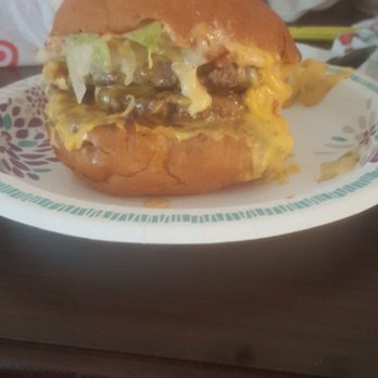 Beth's Burger Bar - It is a little messy because of the extra cheese sauce I ordered on it but this is one of the best burgers you're going to ever taste! - Burgers Near Me - Orlando, Florida