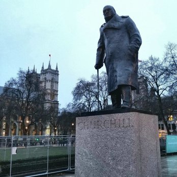 Parliament Square - Sir Winston Churchill statue, with Westminster Abbey in the background. - Venues & Event Spaces Near Me - London, XGL Parliament Square - Sir Winston Churchill statue, with Westminster Abbey in the background. - Venues & Event Spaces Near Me - London, XGL