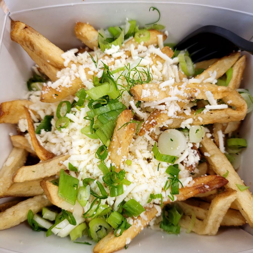 Nick The Greek - Greek garlic and cheese fries with scallions and dill - Greek Near Me - Berkeley, California Nick The Greek - Greek garlic and cheese fries with scallions and dill - Greek Near Me - Berkeley, California