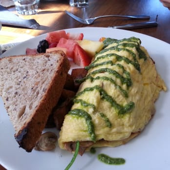 The Raymond 1886 - Omelettes -Tomatoes, spinach, mushrooms, goat cheese, & pesto - New American Near Me - Pasadena, California The Raymond 1886 - Omelettes -Tomatoes, spinach, mushrooms, goat cheese, & pesto - New American Near Me - Pasadena, California