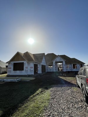 Lopez Construction and Roofing Logo