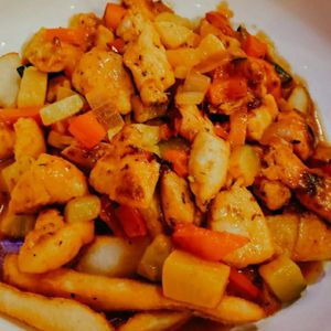 Photo of Three Lions Pub - Shorewood, WI, United States. Chicken and roasted curry