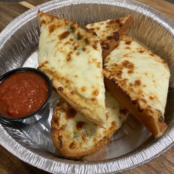 Pizzeria Lucca - three slices of pizza on a plate - Pizza Near Me - Minneapolis, Minnesota