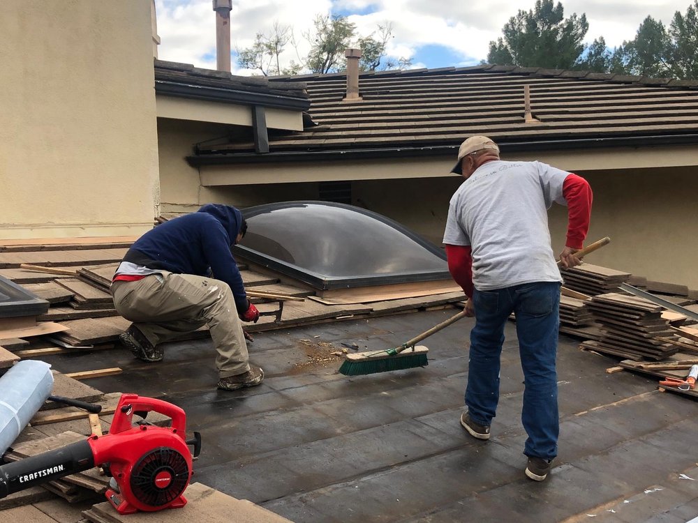 Slide of HUS Roofing