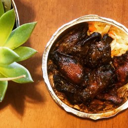 Jerk wings, rice & peas with oxtail gravy, cabbage, plantains Jerk wings, rice & peas with oxtail gravy, cabbage, plantains