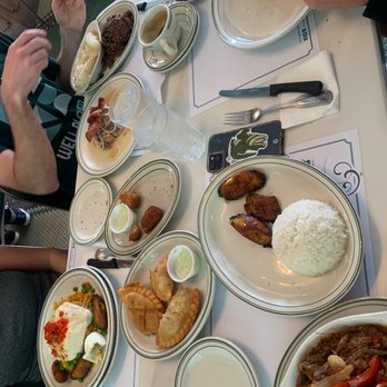 Versailles - Sunday special imperial rice, croquettes, empanadas, ropa vieja, cuban sándwich, roast pork cuban style - Cuban Near Me - Miami, Florida Versailles - Sunday special imperial rice, croquettes, empanadas, ropa vieja, cuban sándwich, roast pork cuban style - Cuban Near Me - Miami, Florida