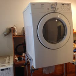 Quality Appliance Service - Our custom built appliance scaffolding is used by our techs to un-stack heavy washer and dryer units for repair.