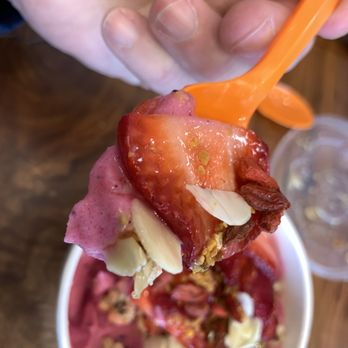 Vitality Bowls - a hand holding a spoon full of food - Juice Bars & Smoothies Near Me - Rocky River, Ohio Vitality Bowls - a hand holding a spoon full of food - Juice Bars & Smoothies Near Me - Rocky River, Ohio