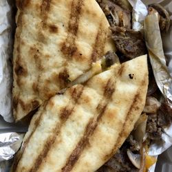 Juicy's Cheesesteaks - "Philly Cheesesteak" (?!) Not as pictured on their menu but still tasty.