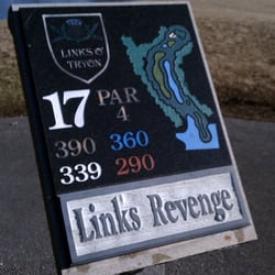Links O'Tryon - Tee marker at the 17th. Big hitters can cut the corner with a good fade for a wedge into the green.