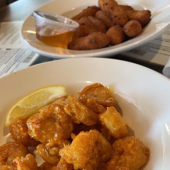 The Lighthouse Restaurant & Dock Bar - Hushpuppies in the back and Bang Bang Shrimp - shrimps were excellent. I wouldn't order the hush puppies again. - Bars Near Me - Solomons, Maryland The Lighthouse Restaurant & Dock Bar - Hushpuppies in the back and Bang Bang Shrimp - shrimps were excellent. I wouldn't order the hush puppies again. - Bars Near Me - Solomons, Maryland
