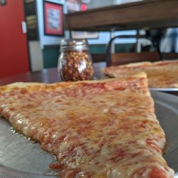 With slices this huge, you know you're gonna burn your mouth With slices this huge, you know you're gonna burn your mouth