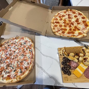 Del Vecchios - two pizzas in boxes on a table - Italian Near Me - Norfolk, Virginia