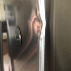 American Freight Furniture, Mattress, Appliance - Dent on the non-dispensing french door